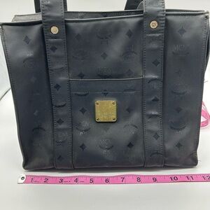 MCM VISETOS shoppers bag small tote. Black in color zipper top